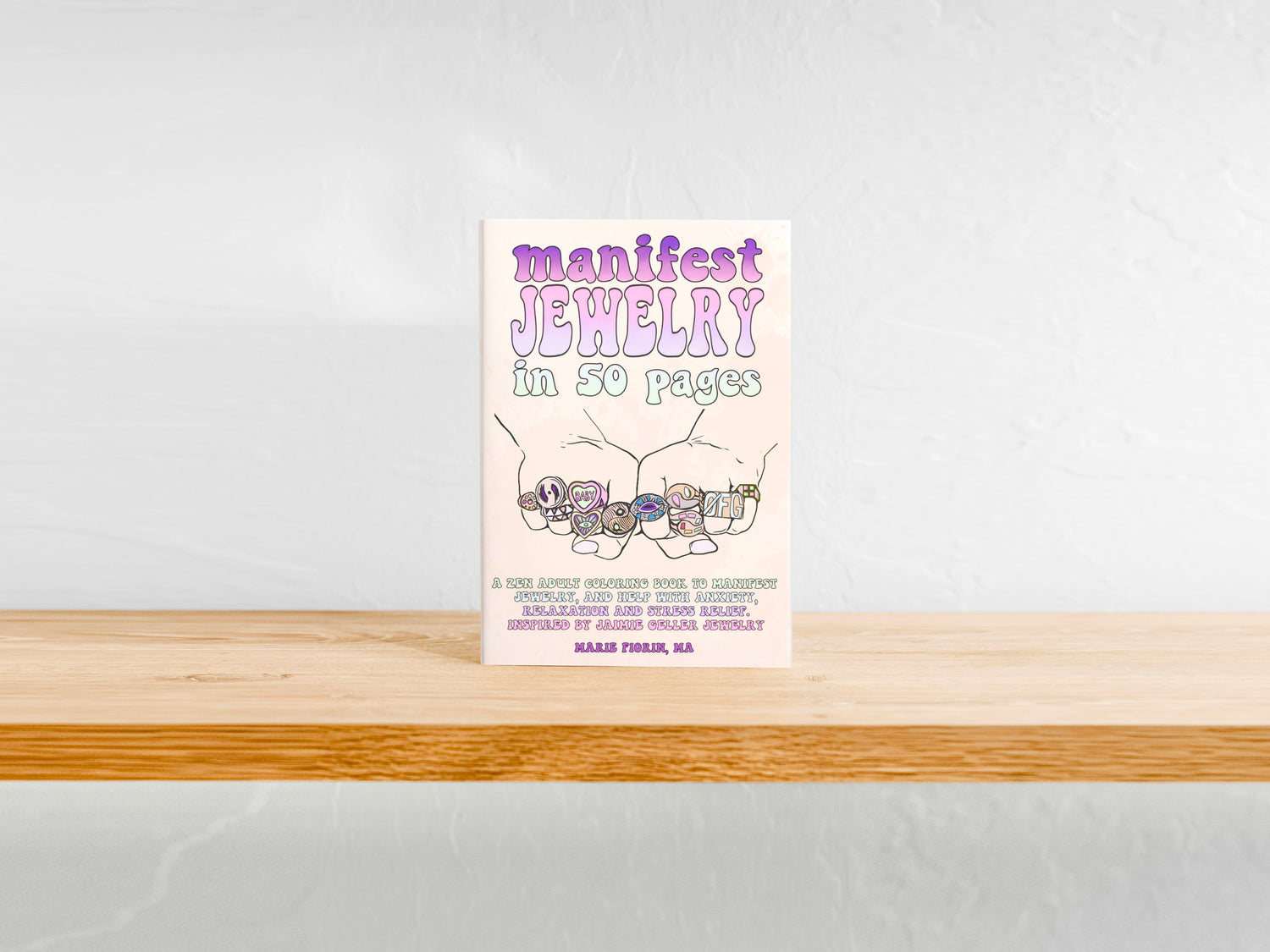 Cover of our manifest jewelry coloring book for adults